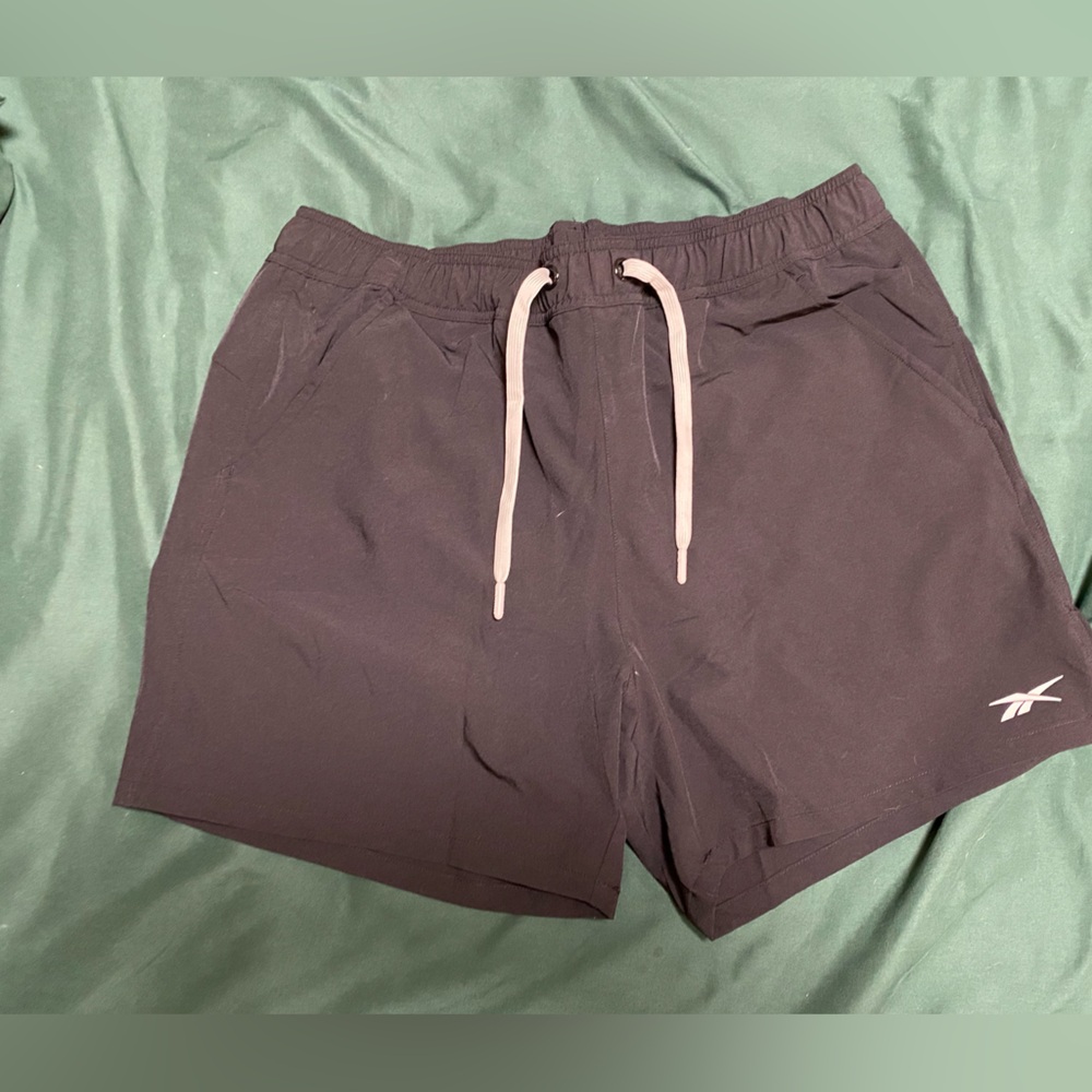 Men’s Reebok Swim Trunks Size Medium. Hits above knee.    Send me offers!